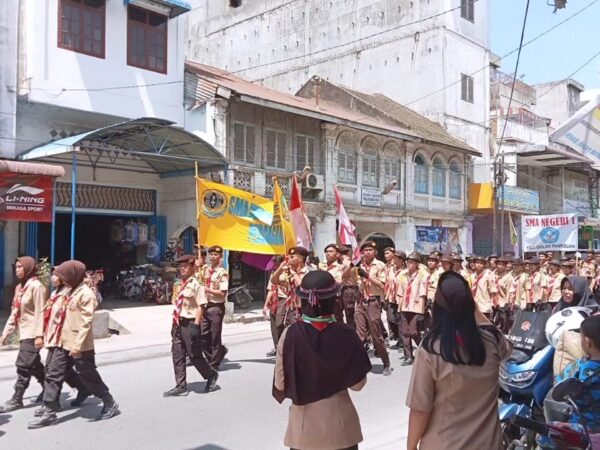 Pramuka SMK Swasta Satrya Budi 1 Perdagangan Mengikuti Kirab Tangkal NAPZA